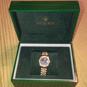 Worn a handful of times, black and gold Rolex